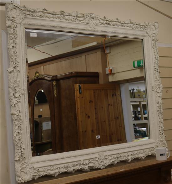A large white painted overmantel mirror, W.150cm